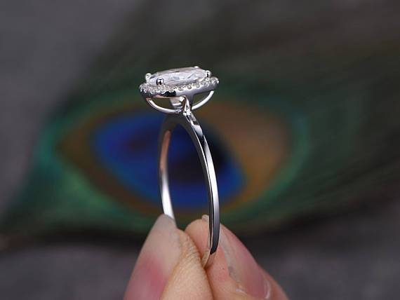 Oval cut Moissanite and Diamond Halo Engagement Ring 