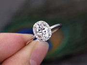 Oval cut Moissanite and Diamond Halo Engagement Ring 