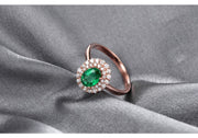 2 Carat Emerald and Moissanite Diamond Halo Engagement Ring in Rose Gold