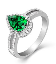 2 Carat Emerald and Moissanite Diamond Halo Engagement Ring in White Gold