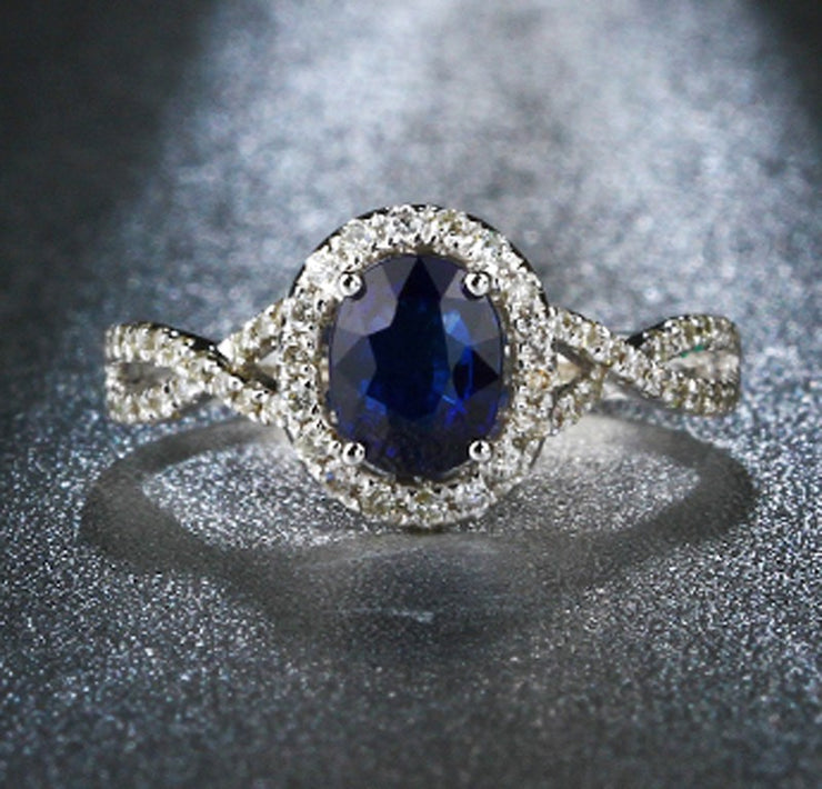 2 Carat oval cut Blue Sapphire and Moissanite Halo Engagement Ring in White Gold