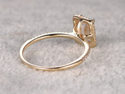 Best 1.25 Ct Moissanite and Diamond Ring with Emerald cut in Yellow Gold
