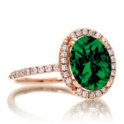 1.5 Carat Oval Classic Emerald and Moissanite Diamond halo ring on 10k Rose Gold