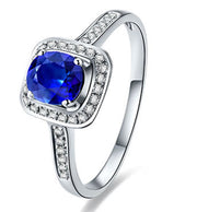 1.50 Carat Blue Sapphire and Moissanite Diamond Halo Engagement Ring for Women in White Gold