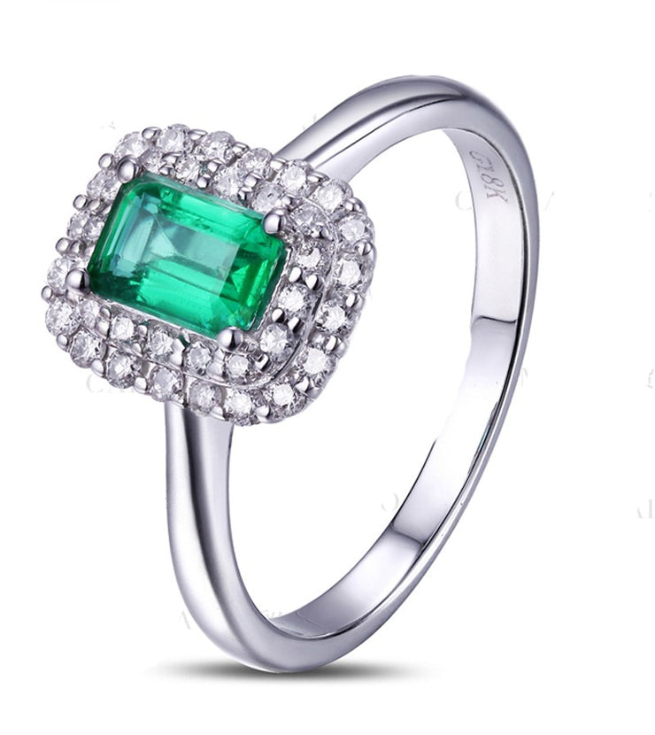 1.50 Carat Emerald and Moissanite Diamond double Halo Engagement Ring in White Gold