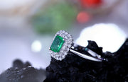 1.50 Carat Emerald and Moissanite Diamond double Halo Engagement Ring in White Gold