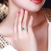 1.50 Carat Emerald and Moissanite Diamond Halo Engagement Ring in White Gold for Her