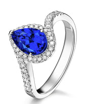 1.50 Carat pear cut Sapphire and Moissanite Diamond curved Engagement Ring for Women in White Gold