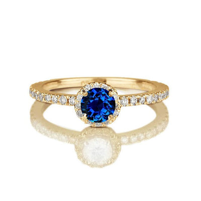 1.50 carat Round Cut Sapphire and Moissanite Diamond Halo Engagement Ring in 10k Yellow Gold