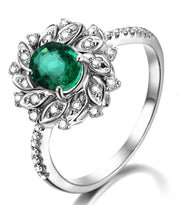 Antique Floral 1.50 Carat Emerald and Moissanite Diamond Engagement Ring in White Gold