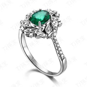 Antique Floral 1.50 Carat Emerald and Moissanite Diamond Engagement Ring in White Gold