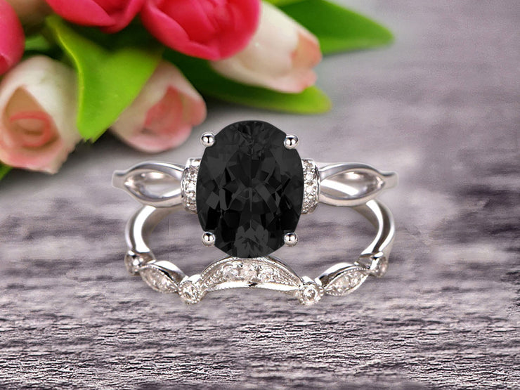 1.50 Carat Oval Cut Black Diamond Moissanite Bridal Ring Set With Curved Loop Stacking Matching Wedding Band On 10k White Gold