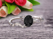 1.50 Carat Oval Cut Black Diamond Moissanite Bridal Ring Set With Curved Loop Stacking Matching Wedding Band On 10k White Gold