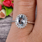 1.25 Carat Oval Cut Aquamarine Engagement Ring With 10k White Gold Halo Flower Prong Set