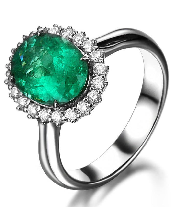 Beautiful 1.50 Carat oval shape Emerald and Moissanite Diamond Halo Engagement Ring in White Gold