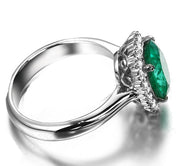 Beautiful 1.50 Carat oval shape Emerald and Moissanite Diamond Halo Engagement Ring in White Gold