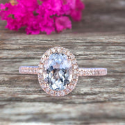 1.50 Carat Oval Cut Aquamarine Halo Engagement Ring on 10k Rose Gold 