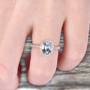 1.50 Carat Oval Cut Aquamarine Halo Engagement Ring on 10k Rose Gold 