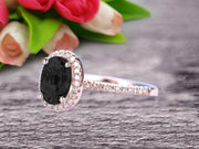 1.50 Carat Oval Cut Black Diamond Moissanite Halo Engagement Ring on 10k Rose Gold 