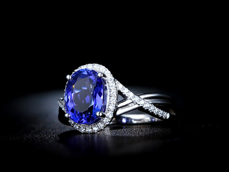 Inexpensive 1.50 Carat Blue Sapphire and Moissanite Diamond Infinity Engagement Ring in White Gold