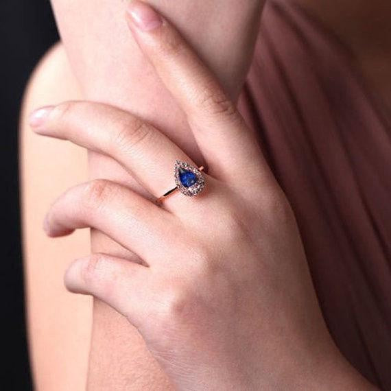 1.25 Carat Blue Sapphire and Moissanite Diamond Engagement Ring in 10k Rose Gold for her