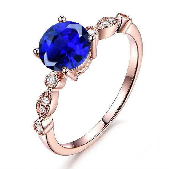 1.25 Carat Blue Sapphire and Moissanite Diamond Engagement Ring in 10k Rose Gold