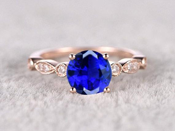 1.25 Carat Blue Sapphire and Moissanite Diamond Engagement Ring in 10k Rose Gold