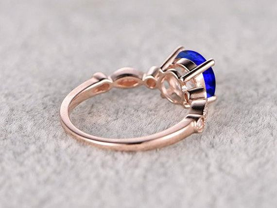 1.25 Carat Blue Sapphire and Moissanite Diamond Engagement Ring in 10k Rose Gold