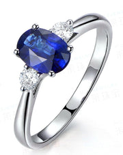 Trilogy Half Carat oval cut Sapphire and Round Moissanite Diamond Engagement Ring in White Gold