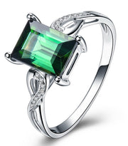 Unique 1.50 Carat Emerald and Moissanite Diamond Infinity Engagement Ring in White Gold